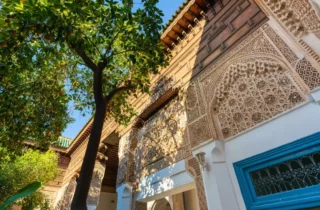 Intricate architectural details of the Bahia Palace in Marrakesh, Morocco, showcasing traditional Moroccan design and craftsmanship.