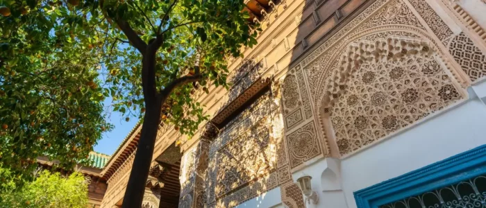 Intricate architectural details of the Bahia Palace in Marrakesh, Morocco, showcasing traditional Moroccan design and craftsmanship.