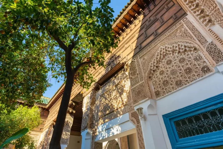 Intricate architectural details of the Bahia Palace in Marrakesh, Morocco, showcasing traditional Moroccan design and craftsmanship.